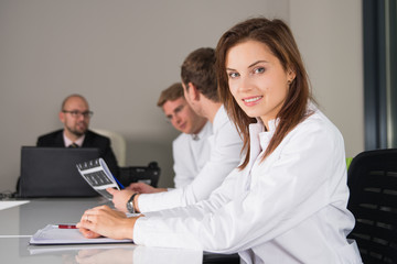 Fototapeta premium medical consultation with three doctors and businesmann.