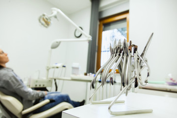 Set Of Metal Dentist's Medical Equipment Tools In Dental Clinic