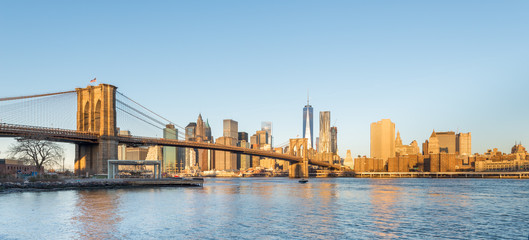 Fototapeta na wymiar Brooklyn Bridge with Freedom Tower in Morning Light.