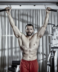 Man preparing to do pull-ups