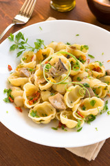 Gnocchi with mushrooms and dried tomatoes, italian cusine