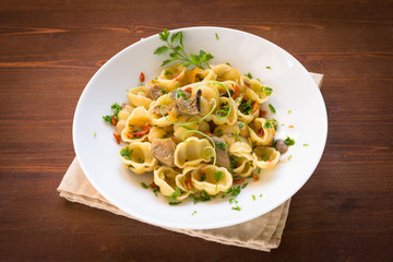 Gnocchi with mushrooms and dried tomatoes, italian cusine