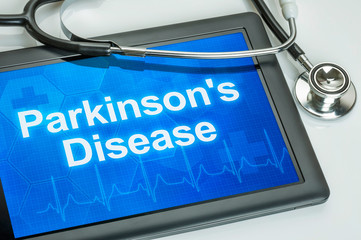 Tablet with the diagnosis parkinson's disease on the display
