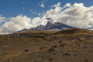 Fototapeta premium Cotopaxi volcano and stony hills