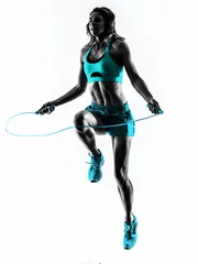 Gordijnen woman fitness Jumping Rope exercises silhouette © snaptitude