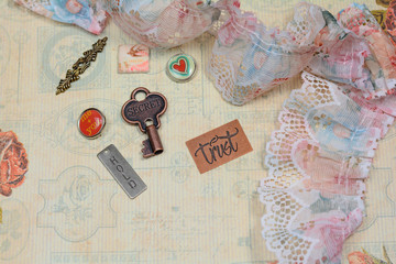 Background consisting of metal plates, things, lace and other vintage items