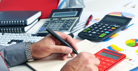 Hands of accountant man