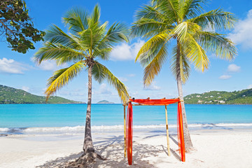 Wedding archway at the tropical beach.