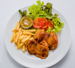 Salad dressing, served with a white background.