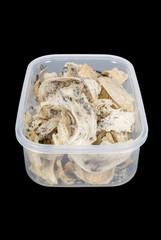 non clean swiftlet nest in plastic box isolated on balck