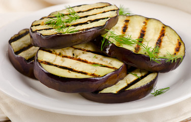 Grilled eggplant slices on  plate