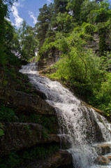 Plakat Falls in mountains of caucasus