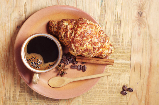 Croissant with cheese and coffee