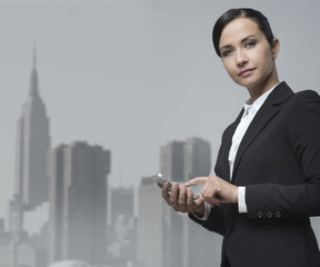 Businesswoman using mobile phone