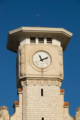 Fototapeta na wymiar Clock of the ancient tower