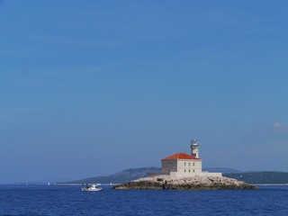 Fototapeta na wymiar The Mulo lighthouse in the Adriatic sea of Croatia