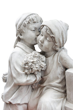 statue of boy hold flower and kiss the girl ( puppy love )