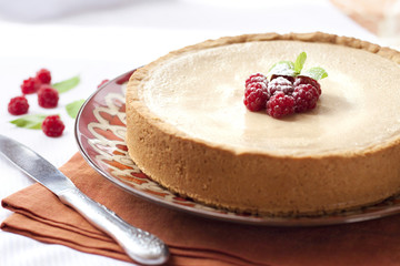 Coffee and cream cake with raspberries