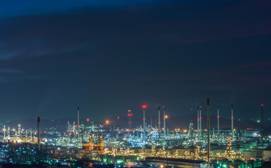 Fototapeta na wymiar Oil refinery power station at twilight