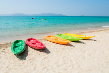 Colorful kayak on tropical beach