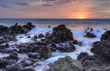 Sunrise and Minamurra volcanic rocks at low tide