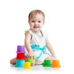 little girl playing with toys