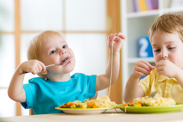 children eating in kindergarten
