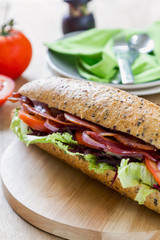 Bacon on wholemeal and sesame baguette sandwich