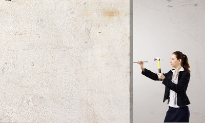 Woman with hammer