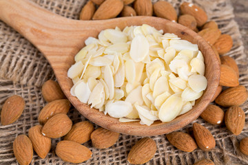 almond slices in  a wooden spoon