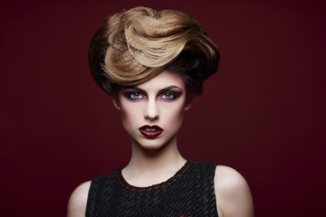 Beauty styled closeup portrait of a young woman