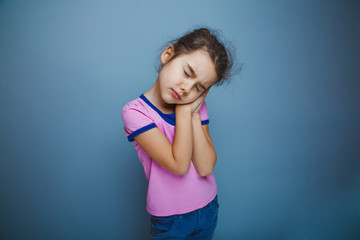 lunatic girl on a gray background