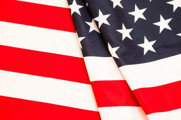 Fototapeta premium Flag of the United States. Pure linen fabric flag carefully fold