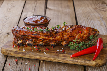 baked pork ribs on the board