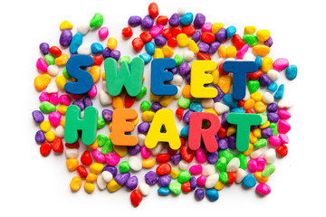 sweet heart word in colorful stone