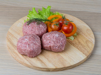 Raw burger cutlet