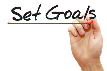 Hand writing Set Goals with red marker, business concept