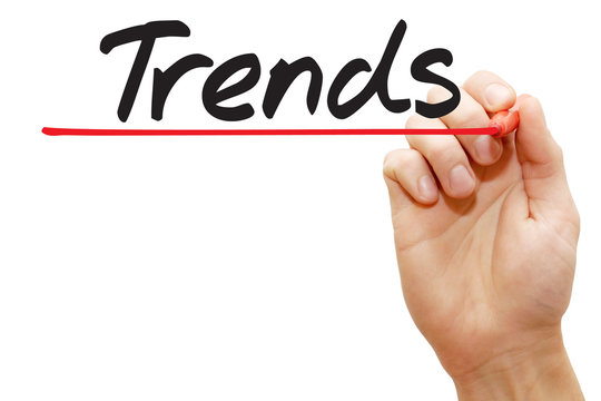 Hand writing Trends with red marker, business concept