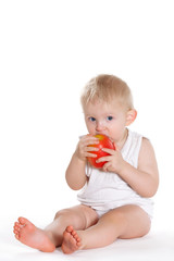 A child eats an Apple