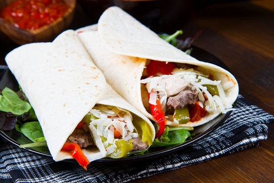 Mexican Chicken And Beef Fajitas With Vegetables And Tortillas