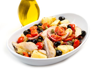 Mackerels with potatoes,tomatoes,capers and olives