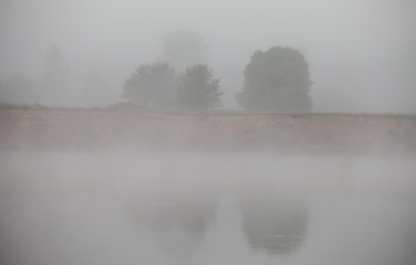 Clouds reflecting in the lake, Ukraine.