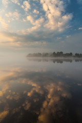 Fototapeta na wymiar Clouds reflecting in the lake, Ukraine.