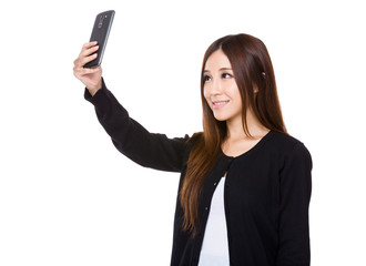 Woman take selfie with mobile phone