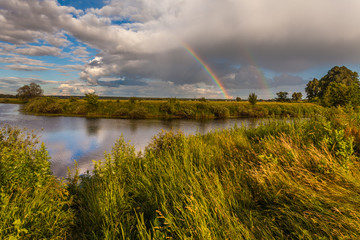 colorful Ranibow over the falls and water
