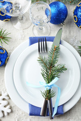 Stylish blue and white Christmas table setting