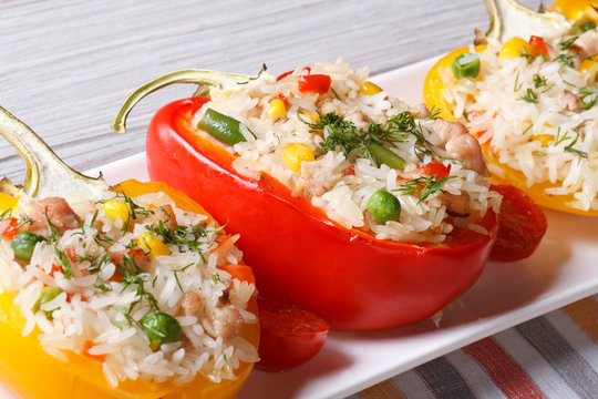peppers filled with rice, vegetables and meat macro horizontal