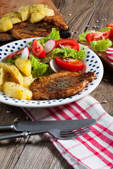 Grilled meat with salad.