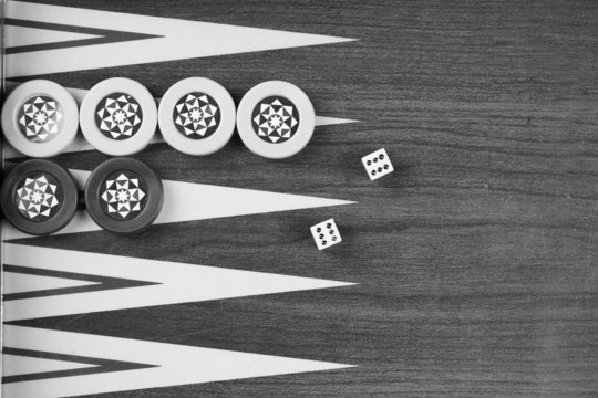 Backgammon table Turkish tavla and double six dice closeup