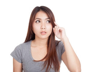 Fototapeta premium Young Asian woman is thinking